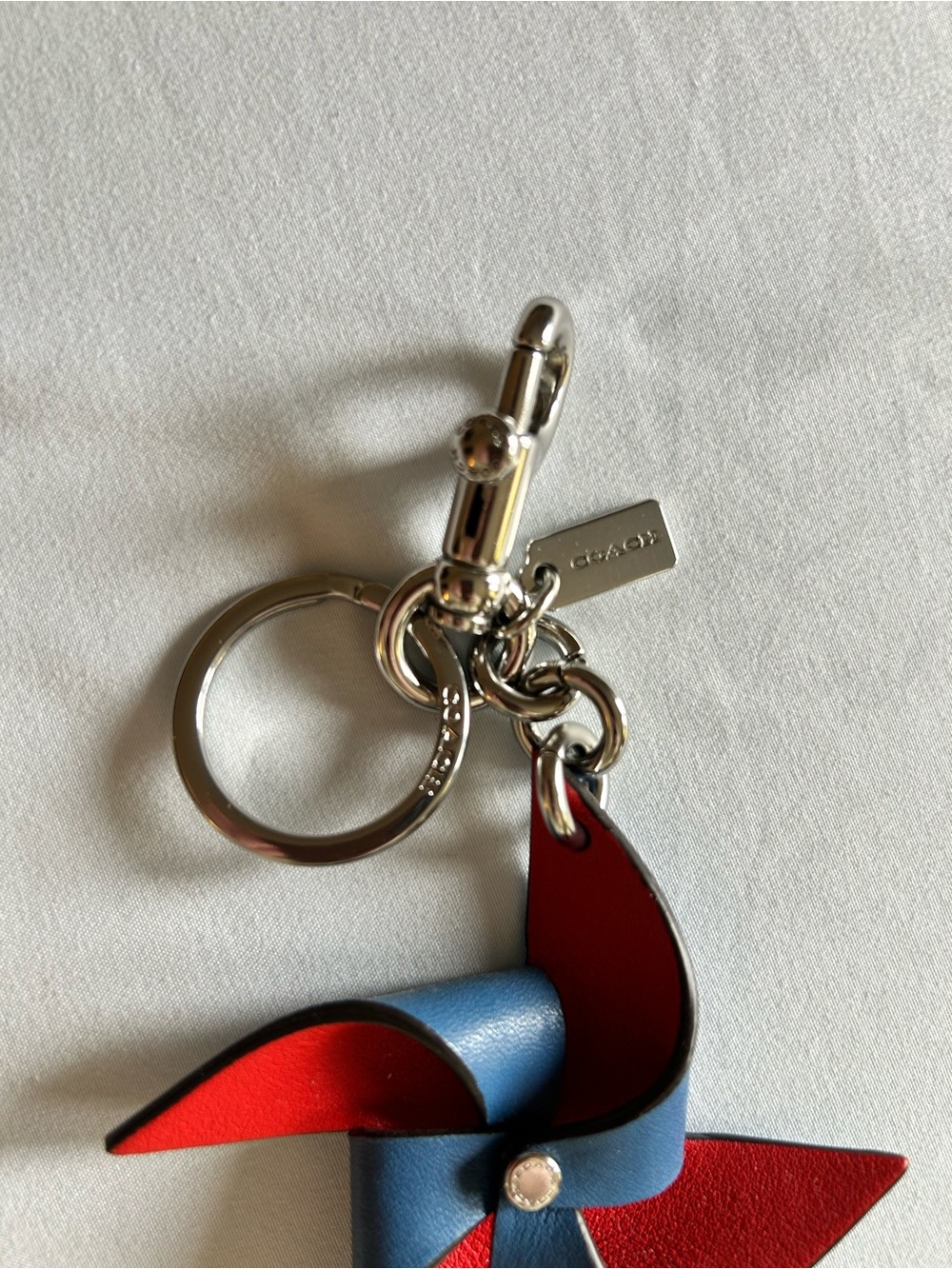 Coach Two-Tone Pinwheel Key Charm in Blue and Red - Picture 3 of 4